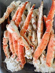 Delicious frozen king crab legs available at the fish shop