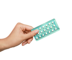 Woman holding blister of oral contraception pills on white background, closeup