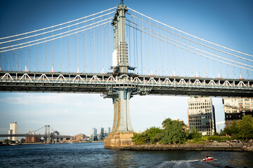 Fototapeta na wymiar Manhattan Bridge over water