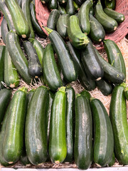Fresh, green Zucchini available on the grocery store shelf