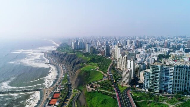 Aerial costa verde in lima with gigantic skyline on a foggy day in peru