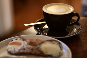 a cup of coffee in a cafe, photo morning coffee luvak cappuccino