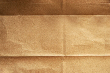 Blank Creased light brown environmental friendly packaging butcher paper with texture background...