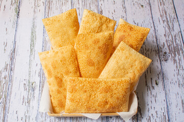 Brazilian Street Food - Fried Pastels in a Basket (Pastel de Feira)