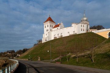View of the Grodno Old Castle (Grodno Upper Castle) on the banks of the Neman River on a sunny day, Grodno, Belarus