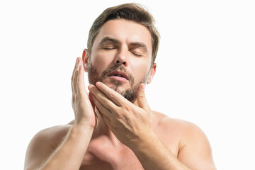 Obraz premium Beautiful man with clean perfect skin. Beauty male skin care. Cosmetology cosmetics beauty and spa. Male facial treatment and wellness. Male coscmetic and beauty concept. Face care, male cosmetics.