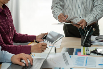 A group of Asian businessmen are brainstorming to analyze financial reporting situations. Calculate...