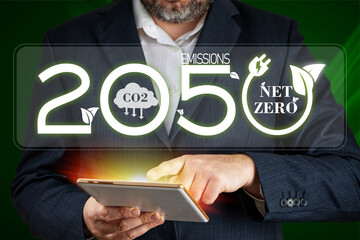 Net zero by 2050. Carbon Neutral Concepts Net Zero Emissions Goals Weather neutral long-term...