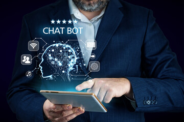 Artificial intelligence, AI chat bot concept. Businessman hands using tablet. ai chatbot...