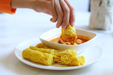 Roti Jala is a popular Malay and Minangkabau tea time snack served with curry dishes which can be found in Indonesia, Malaysia and Singapore. 