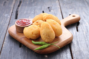 Comro is a typical Sundanese fritter. Comro is made from grated cassava which is shaped round or...