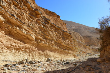 Panoramic view of the beautiful mountains, rocks and canyons of Wadi Ghweir in the Jordan desert
