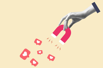 businessman hand holding magnet and magnetizing likes symbol. Concept of social media, influence, popularity, modern lifestyle and ad