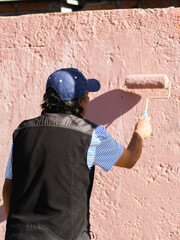 Men painting house