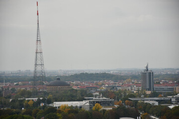 Obraz premium TV tower and high-rise building called City-Hoch Haus in Leipzig, Germany