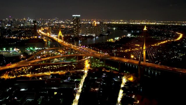 Time lapse of aerial view of city traffic in Bangkok city at night, Thailand, High angle cityscape view.