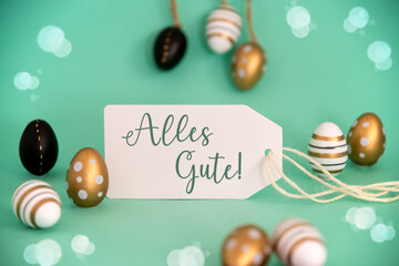 Fototapeta na wymiar Golden Easter Egg Decoration. Label With Alles Gute Means Best Wishes