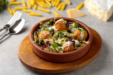 Pasta Brie with balls served in dish isolated on table top view of arabic breakfast