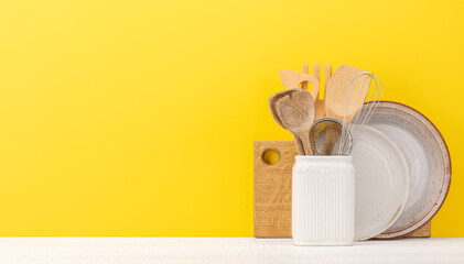 Kitchen utensils on wooden table