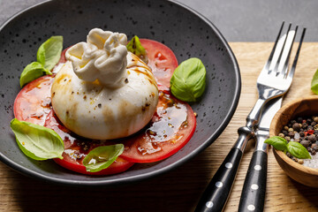 Burrata cheese, tomatoes and basil