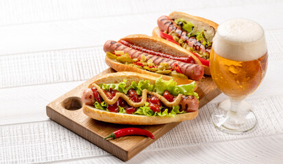 Various hot dog and beer