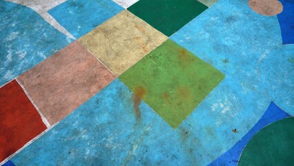 Abstract art of painting on the floor in an elementary school field