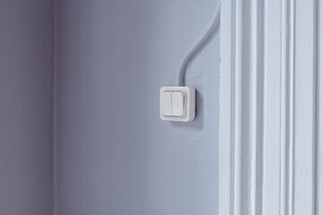 Old retro light switch in living room