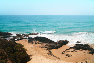 Wide panoramic view of Pacific ocean and Currumbin Beach, one of the jewels in the Gold Coast's crown, regularly voted Queensland's cleanest beach and within the World Surfing Reserve in Australia.