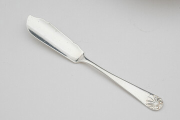 Antique silver refers to silver items, such as tableware, jewelry, and decorative objects, that were made in the past and are valued for their age,