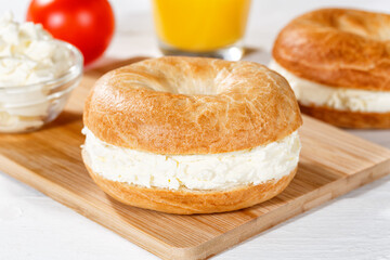 Bagel sandwich with cream cheese for breakfast