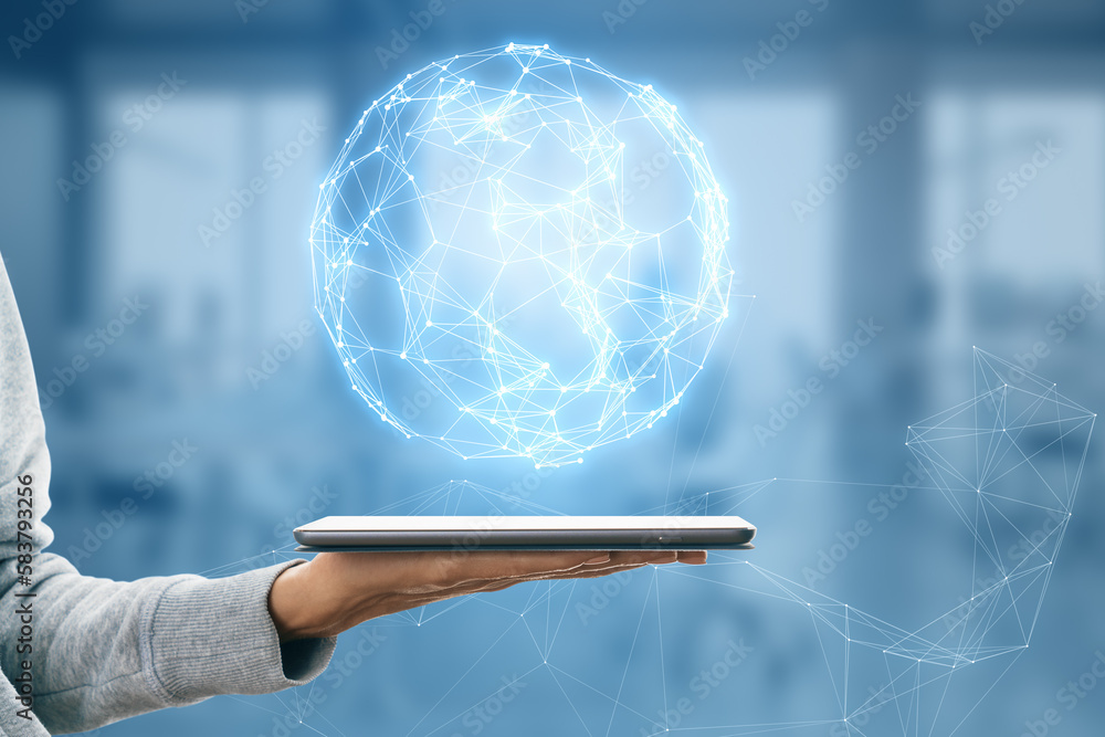 Fototapete close up of female hand holding cellphone with glowing polygonal globe on blurry background. futuris