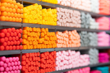 Background of lots assorted colorful pen set. Colored pens on shelves In the shop,Office supplies and stationery. Colorful pens arranged on shelves selling stationery.