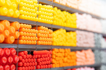 Background of lots assorted colorful pen set. Colored pens on shelves In the shop,Office supplies and stationery. Colorful pens arranged on shelves selling stationery.