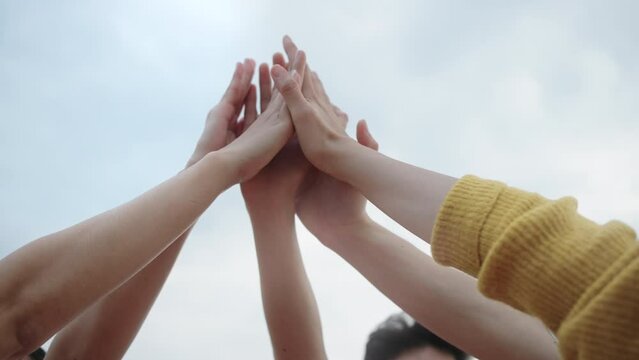 Panoramic Teamwork,empathy,partnership and Social connection in business join hand together concept.Hand of diverse people connecting.Power of volunteer charity work,Stack of people hand. 