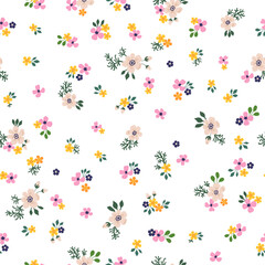 A pattern of pink, orange, purple and soft neutral beige flowers with green leaves. Seamless floral vector repeating pattern.
