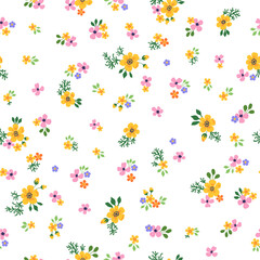 A pattern of small yellow, pink and purple flowers with green leaves on a white background. Seamless floral vector repeating pattern.