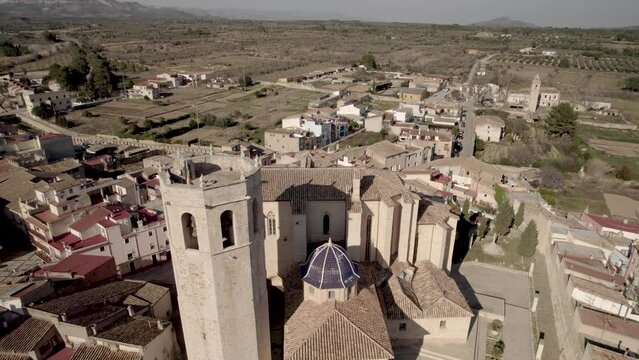 Revealing Drone 4K aerial view of Archiprestal Church of Sant Mateu in Spain