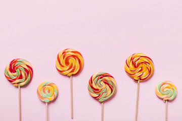 Set of colorful lollipops on colored background. Summer concept. Party Happy Birthday or Minimalist Concept