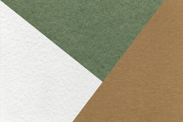 Texture of craft white, brown and green shade color paper background, macro. Vintage abstract olive cardboard