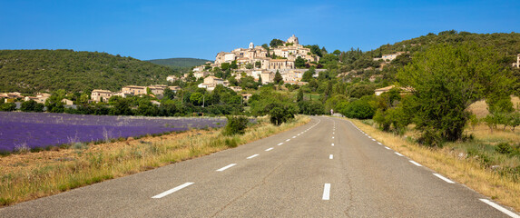 tour tourism in France,  road in provence and typical village with lavender field - obrazy, fototapety, plakaty