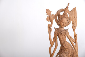 Wonderful Balinese wood carved sculpture: Saraswati, the Goddess of science