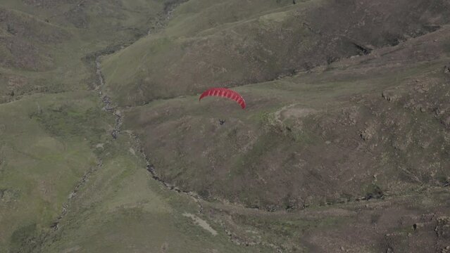 Paragliding seen by drone in the mountains