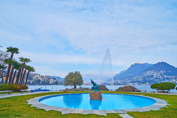 The fountain in park on Riva Paradiso at the Lake Lugano, Lugano, Switzerland