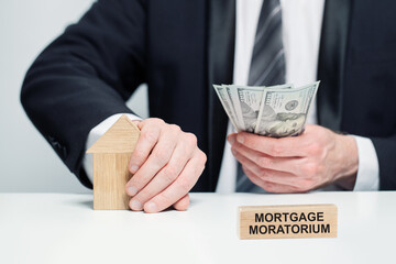 Mortgage Moratorium concept. Moratorium on loan repayments. Financial relief measures. Deferral of...
