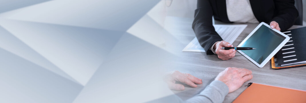 Client meeting female financial adviser; panoramic banner