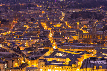 Aerial view of the city of Bath, Somerset illuminated by traffic and street lights at night