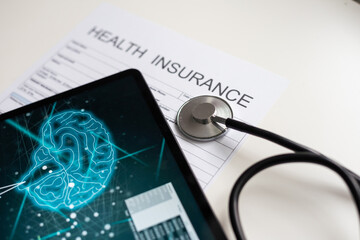 Modern social health insurance program. Tablet computer with healthcare application interface on...