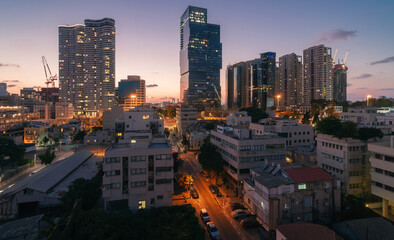 Tel Aviv evening view: modern skyscrapers and dormitory quarters