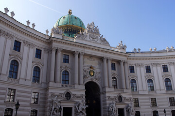 Fototapeta na wymiar Vienna (Austria). Hofburg Imperial Palace seen from the Michaelerplatz in the historic city center of Vienna.