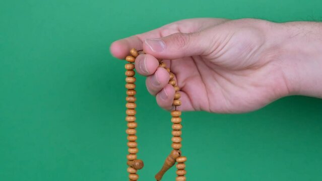 praying hands rosary Islam